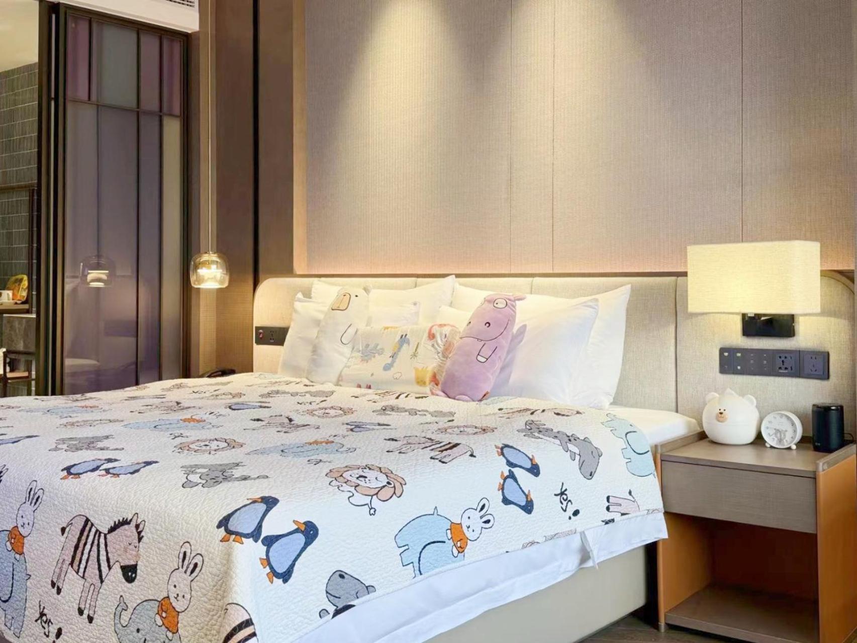 Guangzhou Baiyun Hotel Eksteriør billede A bedroom at the hotel